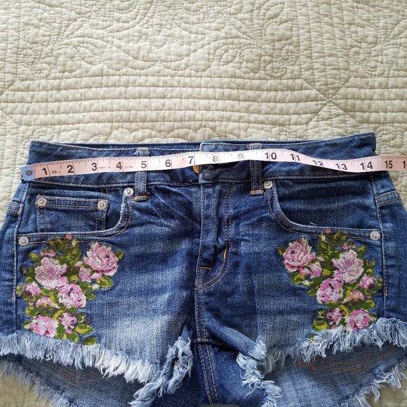 AMERICAN EAGLE Low Ride Raw Hem Embroidered Floral Denim Shorts - Picture 5 of 8